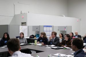 Students listen to panel