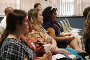 Students listen to panel