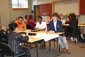 Blackburn students and Fellows network before panel in Huntsville