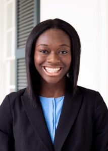 Head shot of Julienne Pharrams smiling at the camera.