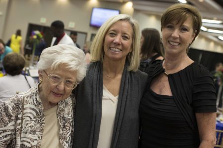 Gloria Blackburn (Blackburn Society and Wife of Dr. Blackburn) and Holly Piper (Advisory Board and Daughter of Dr. Blackburn) join to congratulate Cheree Causey on her induction into the Blackburn Society
