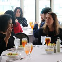 Students on the 2023 Protective Life Travel Experience network at lunch